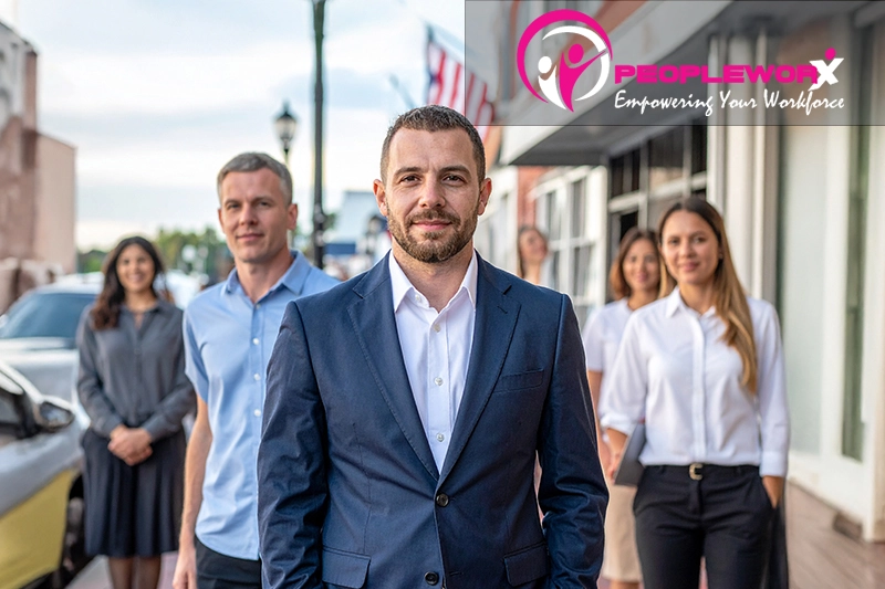 Small business owner with team in a Maryland setting (Main Street storefront, Annapolis