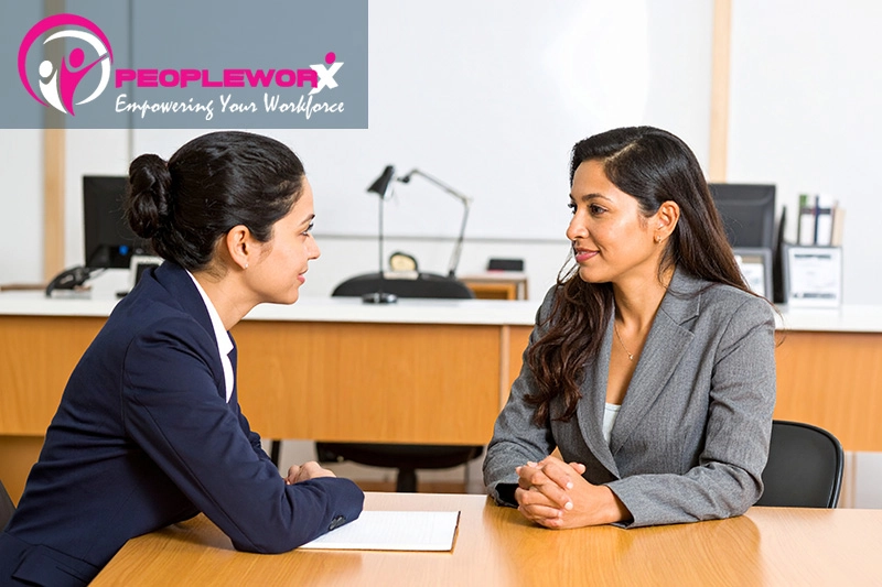 Manager and employee discussing a performance review process